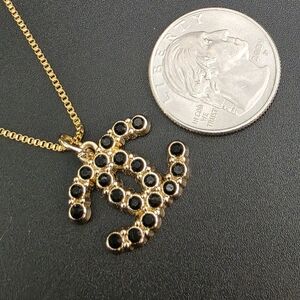 CHANEL Double C Pendant Necklace with Black Stones. 18k PVD Chain